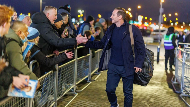 Coventry manager Frank Lampard high fives fans as he arrives at the CBS Arena before the game against Middlesbrough
