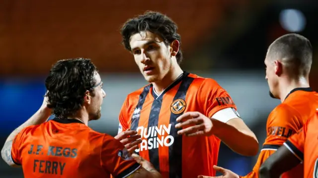Ross Graham celebrates