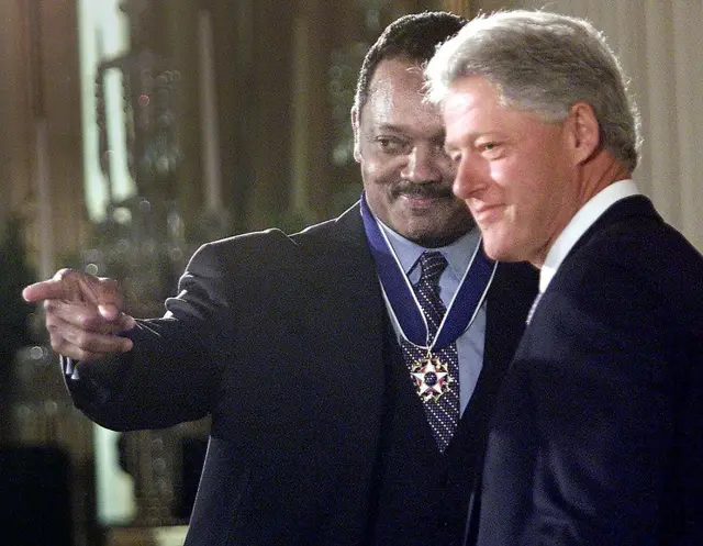 Clinton and Jackson together, Jackson wearing his Presidential Medal of Freedom