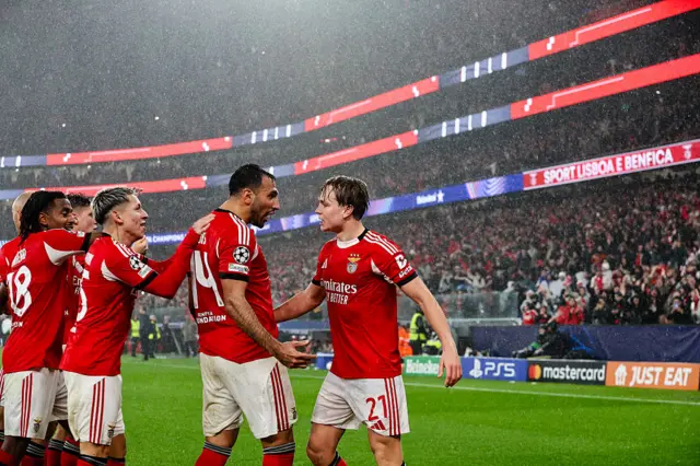 Benfica's Andreas Schjelderup celebrates with team mates scoring their firstt goal