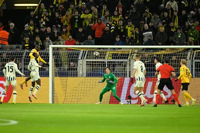 Dortmund's Guinean forward #09 Serhou Guirassy (L) scores his team's first goal