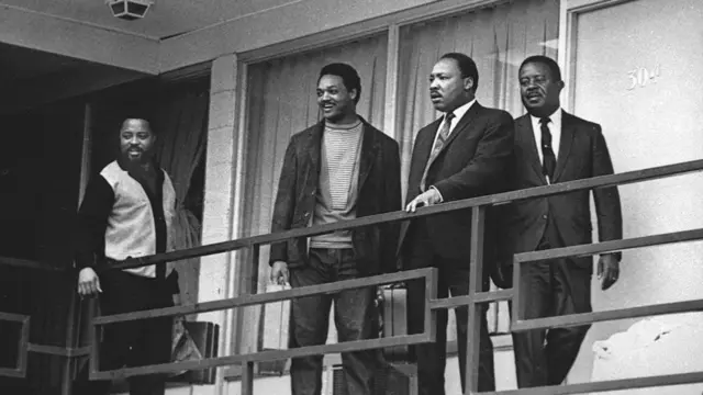 Rev. Martin Luther King Jr., second from right, stands with Hosea Williams, left, Jesse Jackson, second from left, and Ralph Abernathy, right, on the balcony of the Lorraine Motel in Memphis, Tenn., a day before he was assassinated at approximately the same place, April 3, 1968