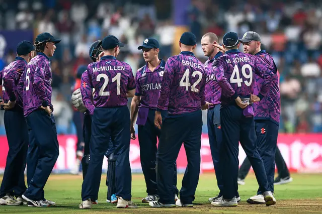 Michael Leask of Scotland celebrates the wicket of Kushal Bhurtel of Nepal