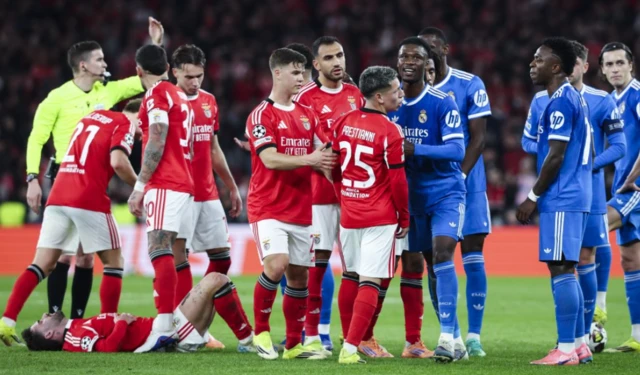 Benfica's Gianluca Prestianni argues with Real Madrid's Vinicius Junior
