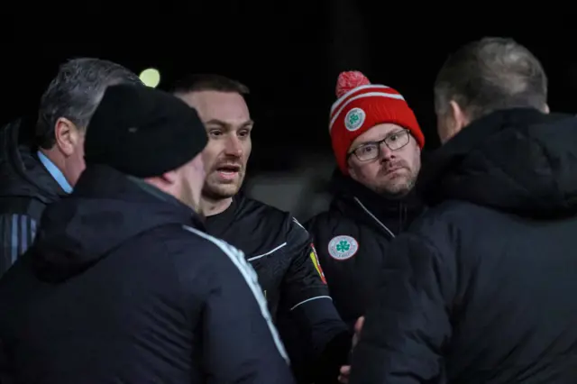 Discussions between match officials and teams