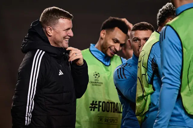 Eddie Howe smiles during the open training session