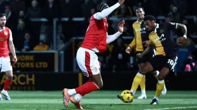 Burton score a goal
