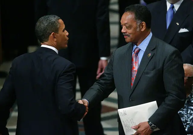 Former US President Barack Obama greets Jackson at the funeral service for civil rights leader Dorothy Height at the Washington National Cathedral April 29, 2010 in Washington, DC