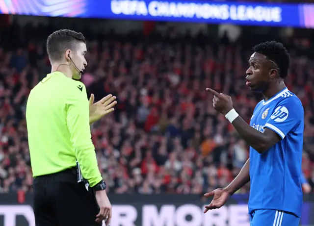 Vinicius Junior talks with French referee Francois Letexier