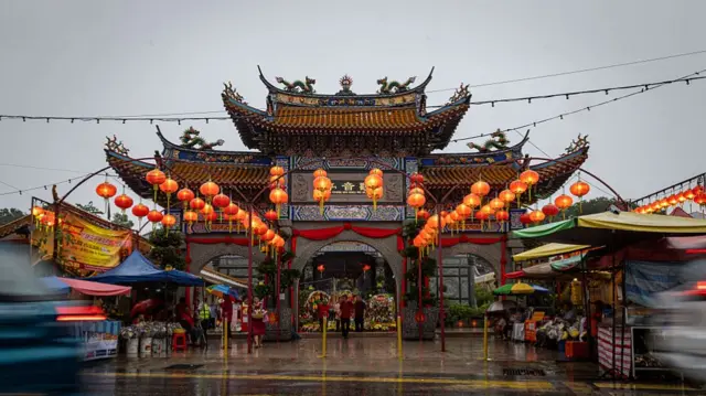 A Buddhist temple in Malaysia is lit up for the Lunar New Year