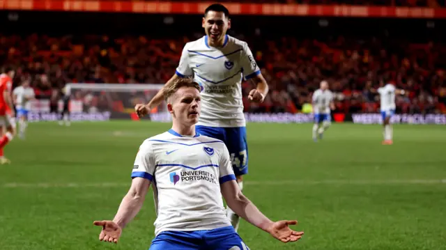 Terry Devlin celebrates for Portsmouth at Charlton