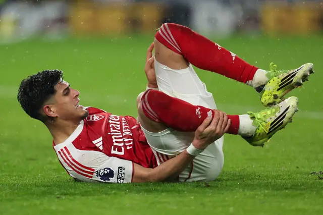 Piero Hincapie of Arsenal goes down injured
