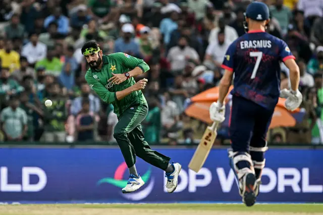 Usman Tariq fields the ball
