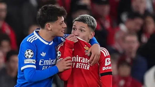 Gianlucca Prestianni with his shirt covering his mouth