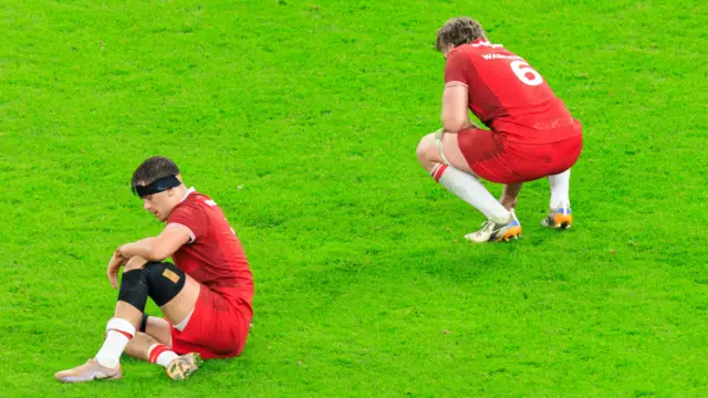 Alex Mann and Aaron Wainwright of Wales after defeat to France