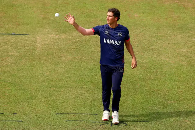 JJ Smit of Namibia prepares to bowl