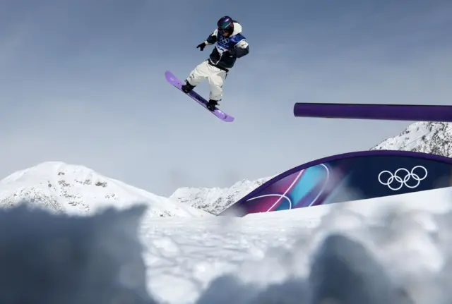 Taiga Hasegawa of Japan competes in the Men's Snowboard Slopestyle final of the Snowboarding competitions at the Milano Cortina 2026 Winter Olympic Games