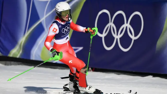 Camille Rast reacts in the finish area
