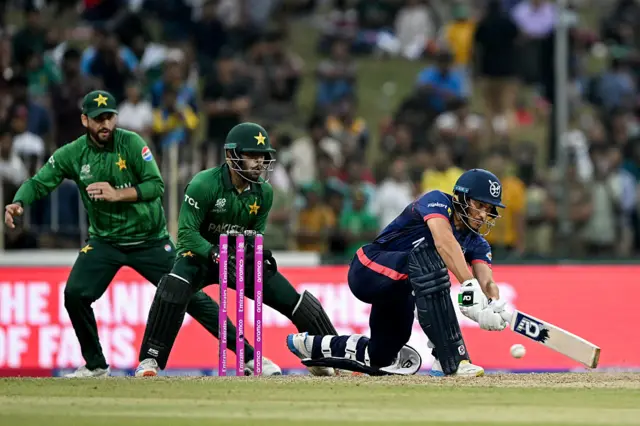 Zane Green (R) plays a shot