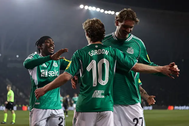Newcastle United's English midfielder #10 Anthony Gordon celebrates a goal with teammates d