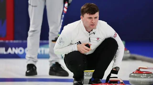 Bruce Mouat of Team Great Britain competes