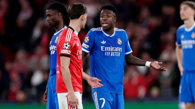 Vini Jr gestures with his arms