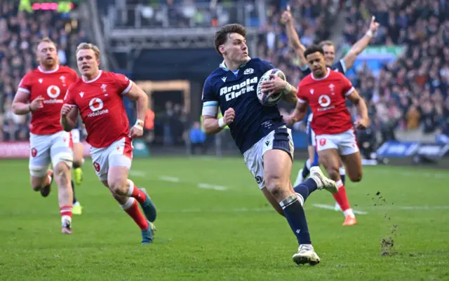 Tom Jordan scores a try for Scotland against Wales