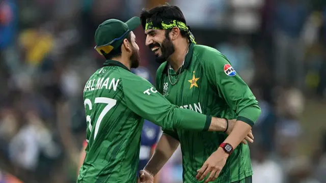 Usman Tariq (R) celebrates with captain Salman Agha