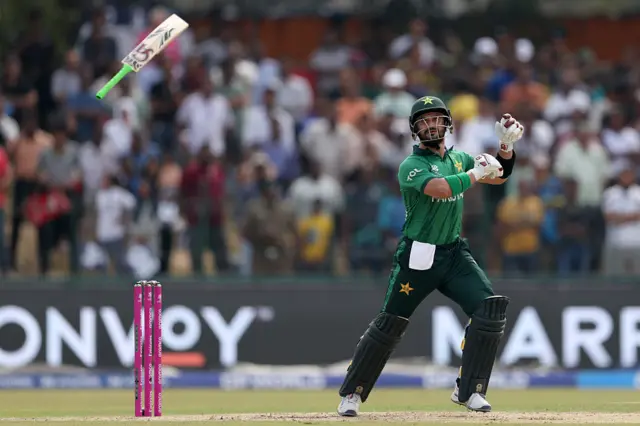 Sahibzada Farhan of Pakistan lets go of his bat