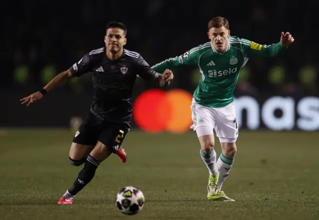 Qarabag's Matheus Silva in action with Newcastle United's Harvey Barnes