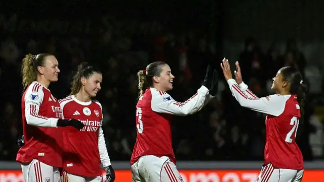 Russo and Hinds high ten after combining for the third goal