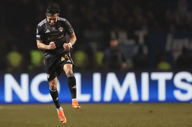 Qarabag's Azerbaijan defender #44 Elvin Cafarguliyev celebrates after scoring the team's first goal