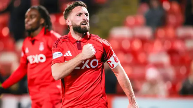 Aberdeen's Graeme Shinnie celebrates after scoring to make it 2-0