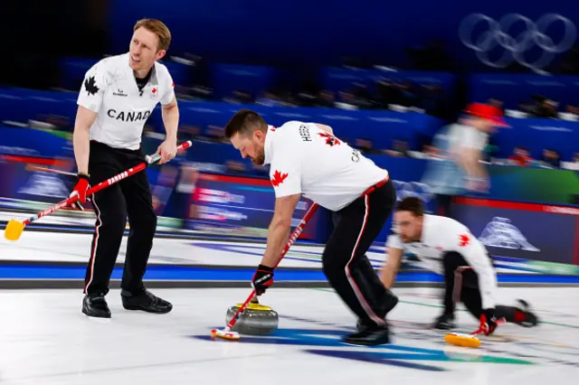 Canada's team competes in the curling men's semi-final between Norway and Canada
