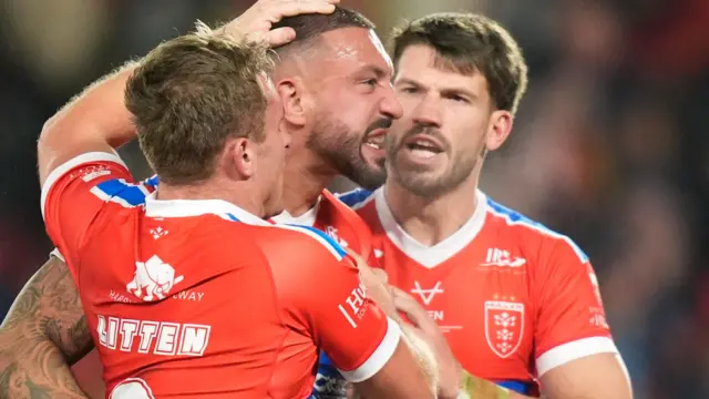 Elliott Minchella celebrates scoring try