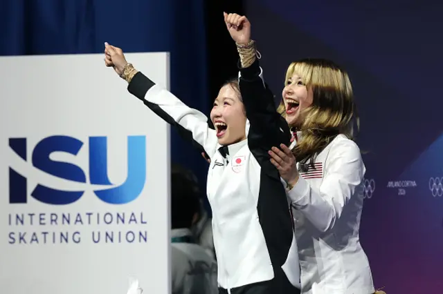 Gold medalist Alysa Liu of Team United States celebrates with bronze medalist Ami Nakai of Team Japan