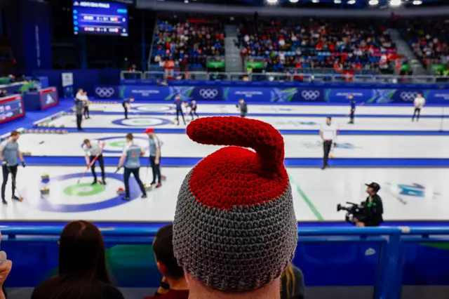 A curling knitted hat
