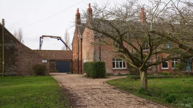 A crane over the top of buildings near Marsh Farm