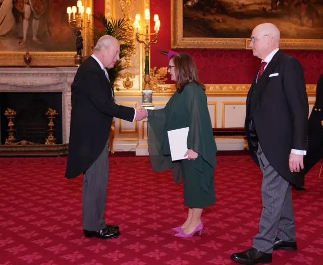 Emma Aparici Vazquez de Parga, Ambassador of Spain, accompanied by Jorge Manuel García Martínez, presents her credentials during an audience with King Charles III at St James's Palace, London.
