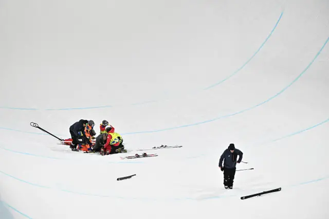 Canada's Cassie Sharpe receives medical assistance after crashing