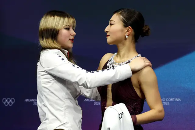 Alysa Liu of Team United States hugs Kaori Sakamoto