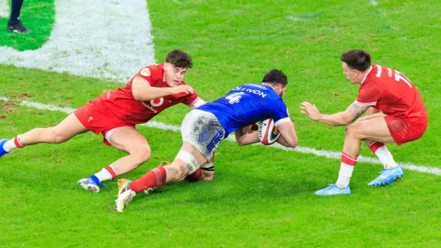 Charles Ollivon dives over for France against Wales