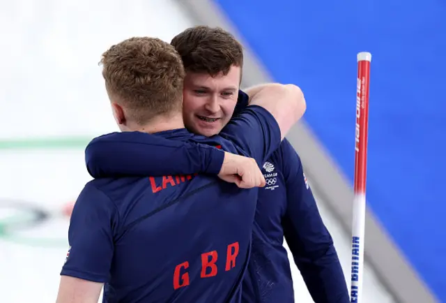 Bruce Mouat and Bobby Lammie of Team Great Britain celebrate victory