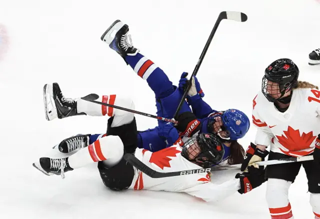 Claire Thompson #42 of team Canada in action with Britta Curl