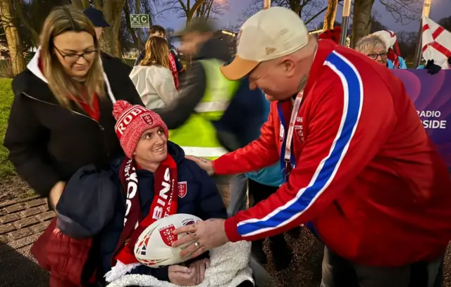 Craig Eskrett being presented with the match ball