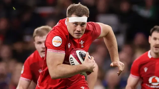Ben Carter carries the ball for Wales