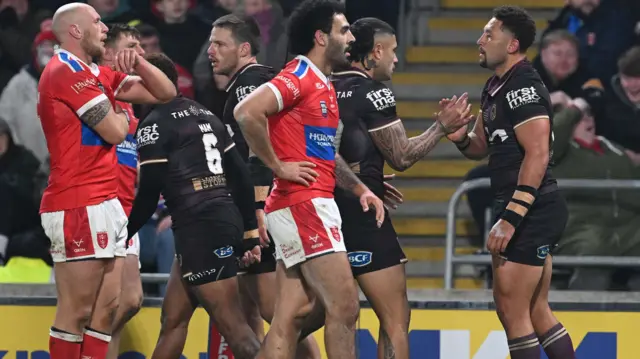 Brisbane celebrate scoring try