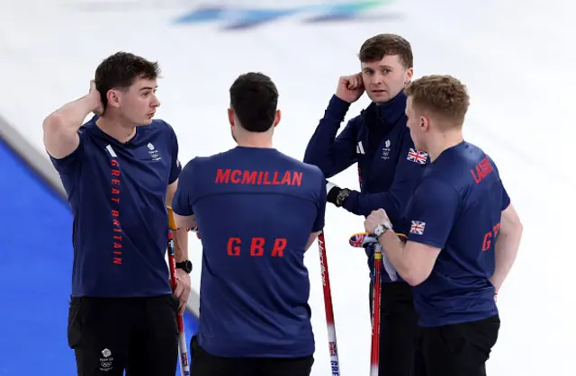 Grant Hardie, Hammy McMillan, Bruce Mouat and Bobby Lammie of Team Great Britain discuss tactics
