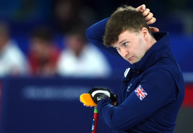Great Britain's Bruce Mouat looks on