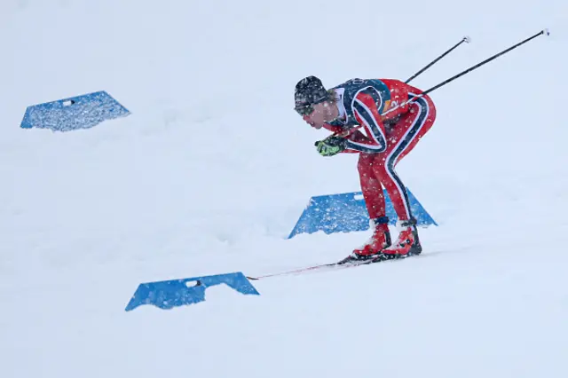 Norway's Andreas Skoglund competes under a snowfall in the cross-country of the nordic combined team sprint large hill event